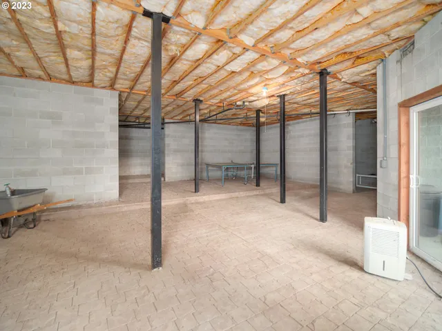 a view of a patio with dining table and chairs barbeque with wooden floor