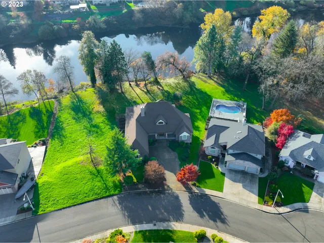 an aerial view of a house with a garden