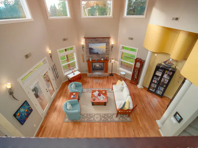 a large kitchen with a table and chairs