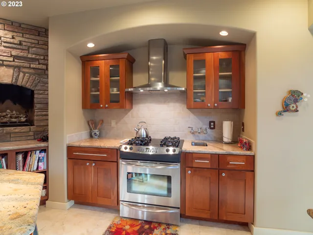 a view of a dining room with furniture large windows and wooden floor