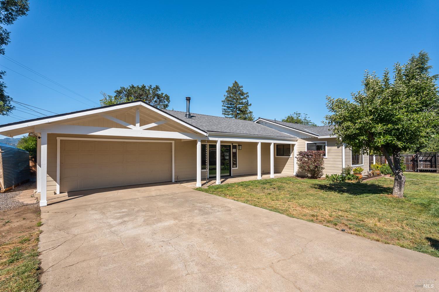 2260 Old River Road Ukiah, CA 95482 - Photo 4 of 29 a front view of a house with a yard