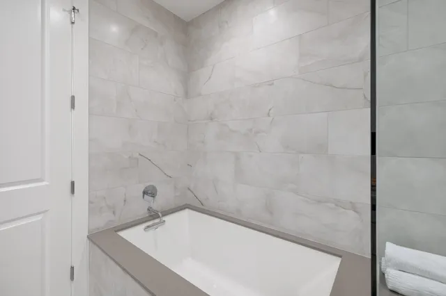 a view of a patio with swimming pool table and chairs