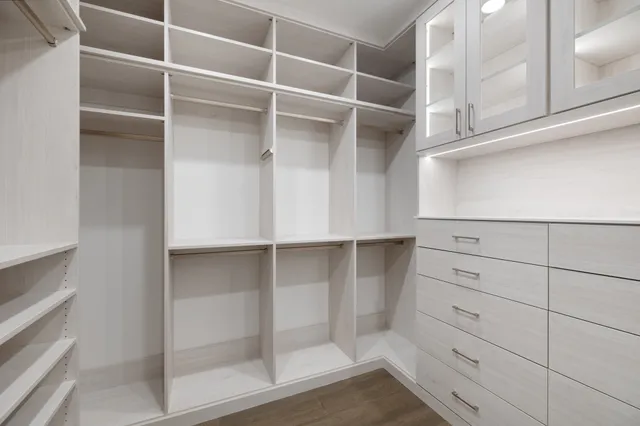 a view of a balcony with chairs and a table