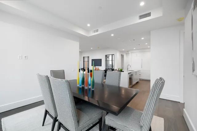 a bathroom with a shower and a sink