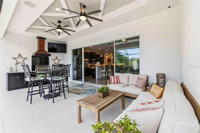 a front view of a house with a garden and plants