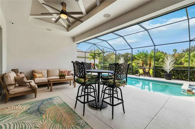 an aerial view of multiple houses with yard