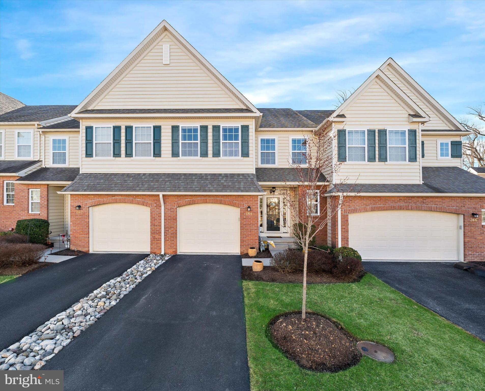 a house view with a garden space