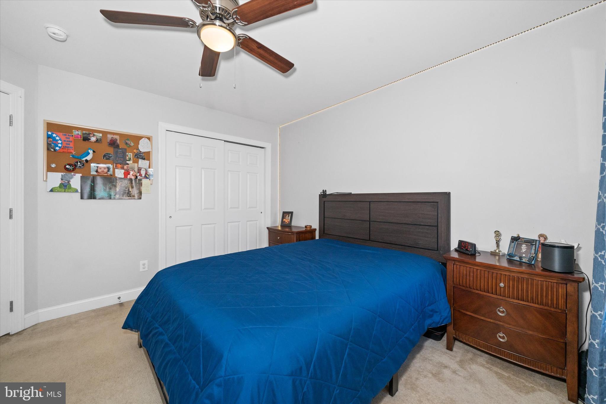 264 Deepdale Drive, Unit 31 Kennett Square, PA 19348 - Photo 14 of 34 a bedroom with a bed and cabinet