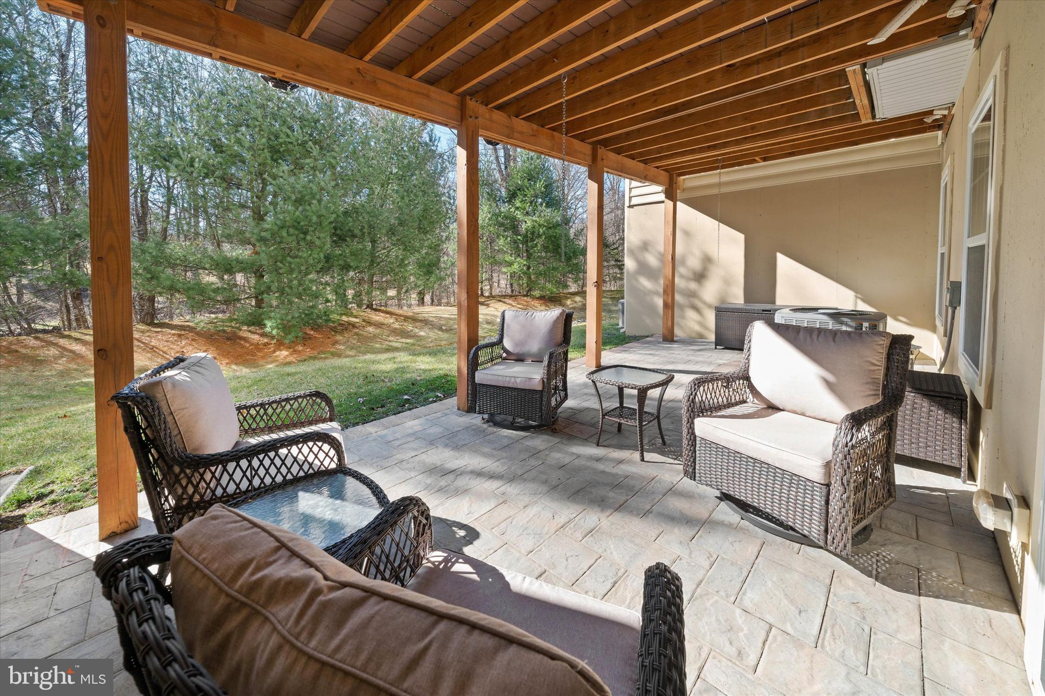 264 Deepdale Drive, Unit 31 Kennett Square, PA 19348 - Photo 28 of 34 a balcony with furniture and a garden