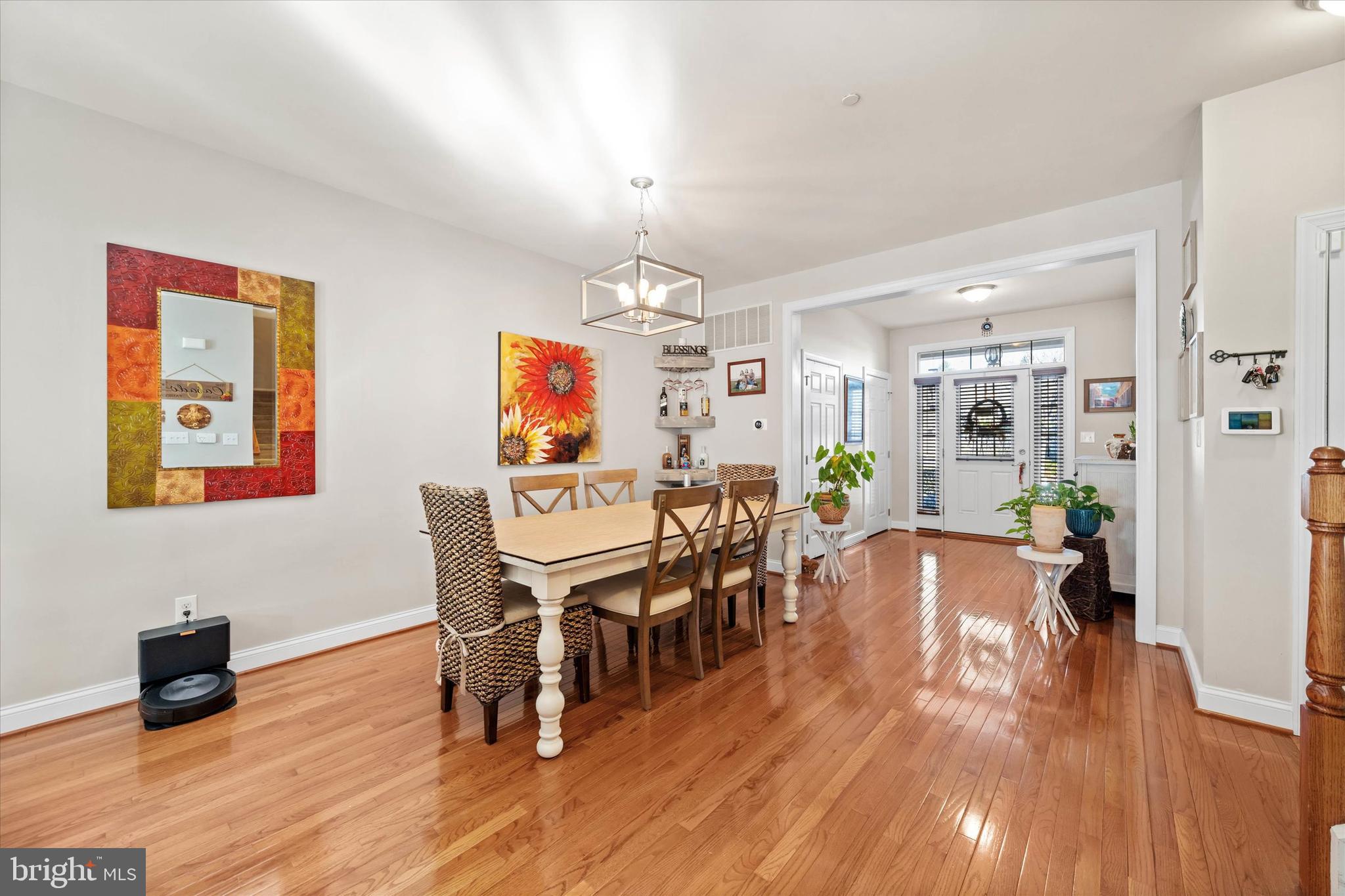 264 Deepdale Drive, Unit 31 Kennett Square, PA 19348 - Photo 4 of 34 a view of a dining room with furniture wooden floor and chandelier