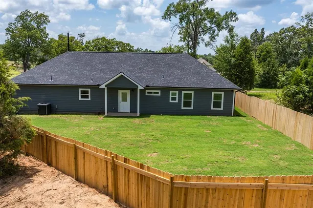 a house view with a garden space
