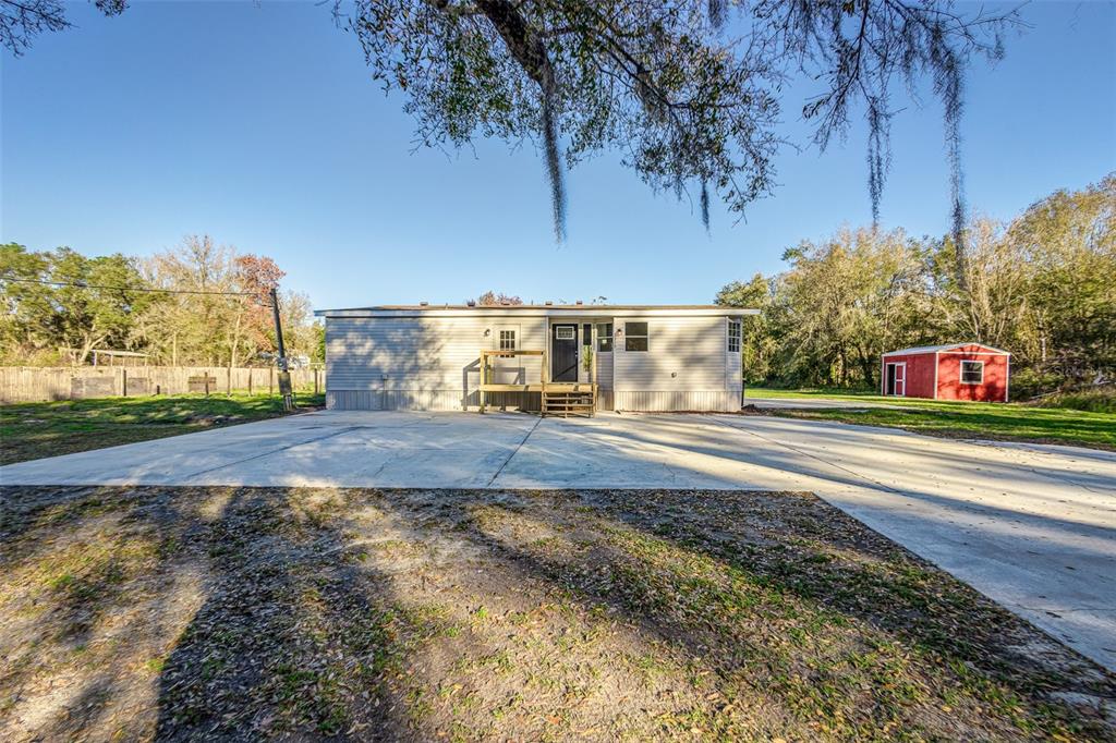 a view of street with houses