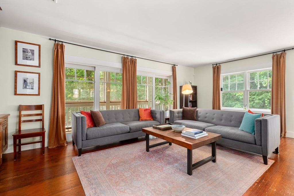 32 Intervale Road Weston, MA 02493 - Photo 14 of 42 a living room with furniture and a large window
