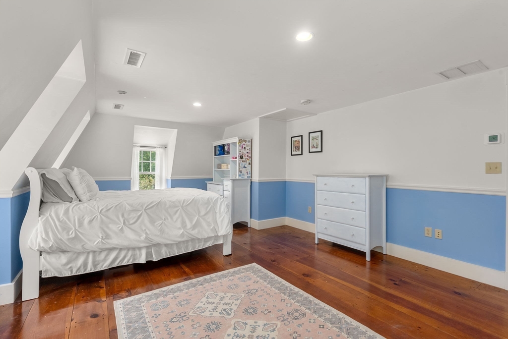 32 Intervale Road Weston, MA 02493 - Photo 26 of 42 a bedroom with a bed and a dresser