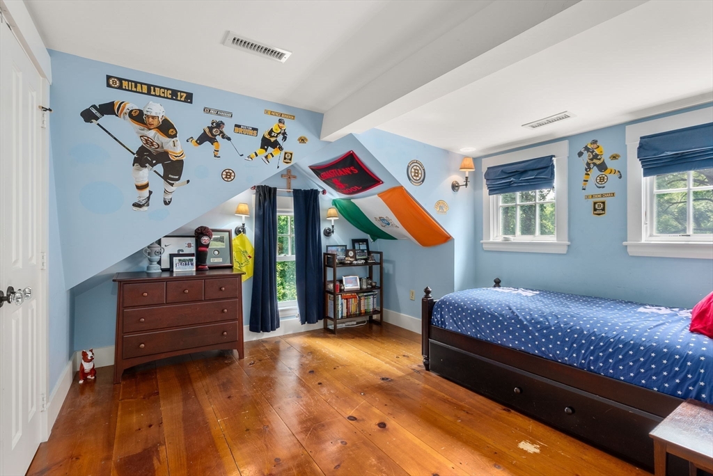 32 Intervale Road Weston, MA 02493 - Photo 27 of 42 a bedroom with a bed and a window