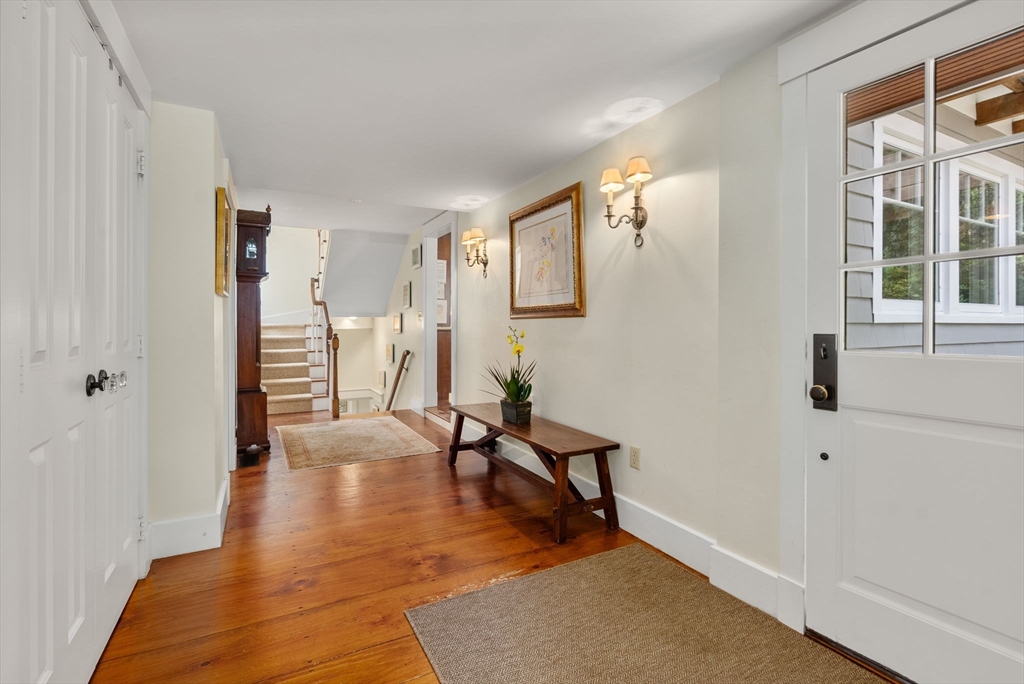 32 Intervale Road Weston, MA 02493 - Photo 3 of 42 a view of a livingroom with furniture and stairs