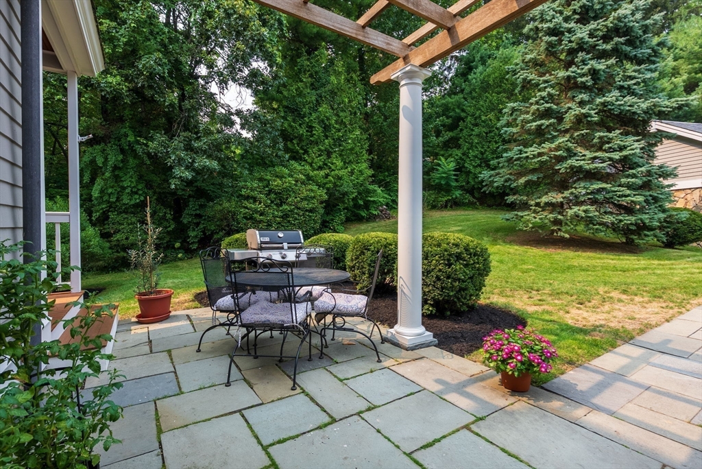 32 Intervale Road Weston, MA 02493 - Photo 33 of 42 a garden view with a seating space