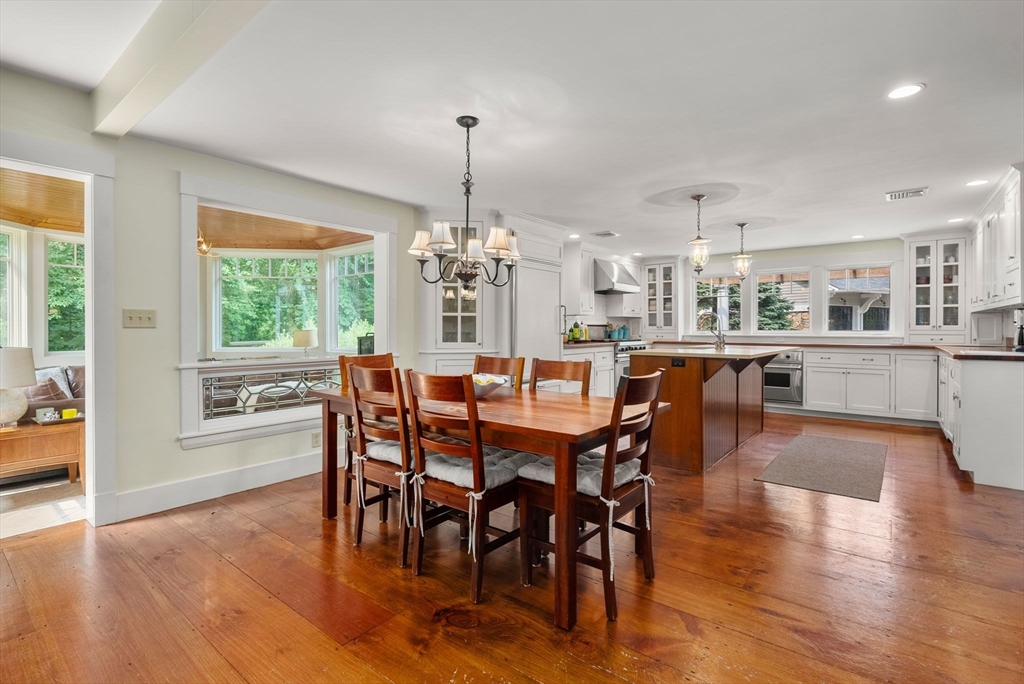 32 Intervale Road Weston, MA 02493 - Photo 10 of 42 a view of a dining room with furniture window and wooden floor