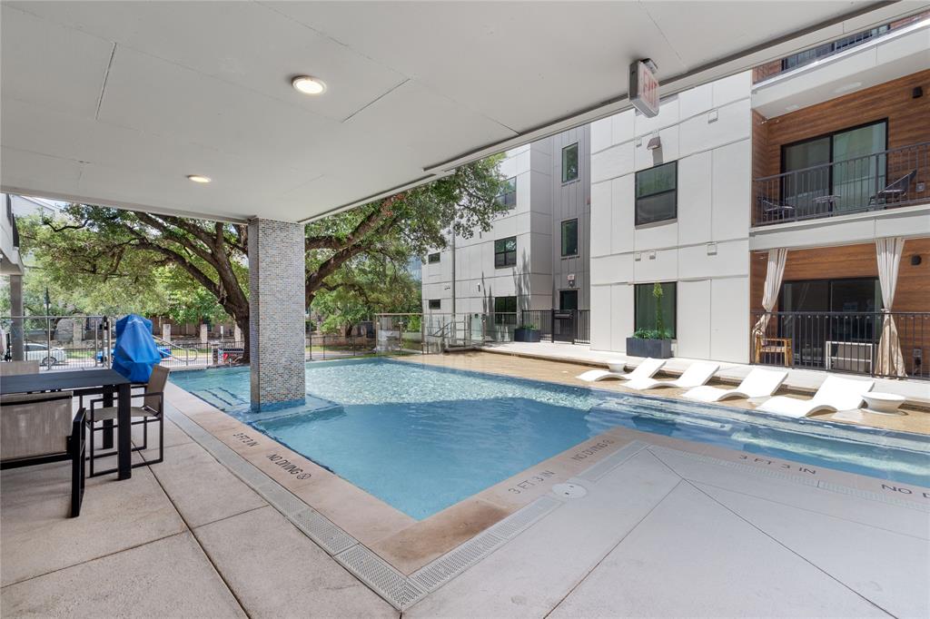 2500 Longview Street, Unit 418 Austin, TX 78705 - Photo 23 of 40 Community pool with a patio