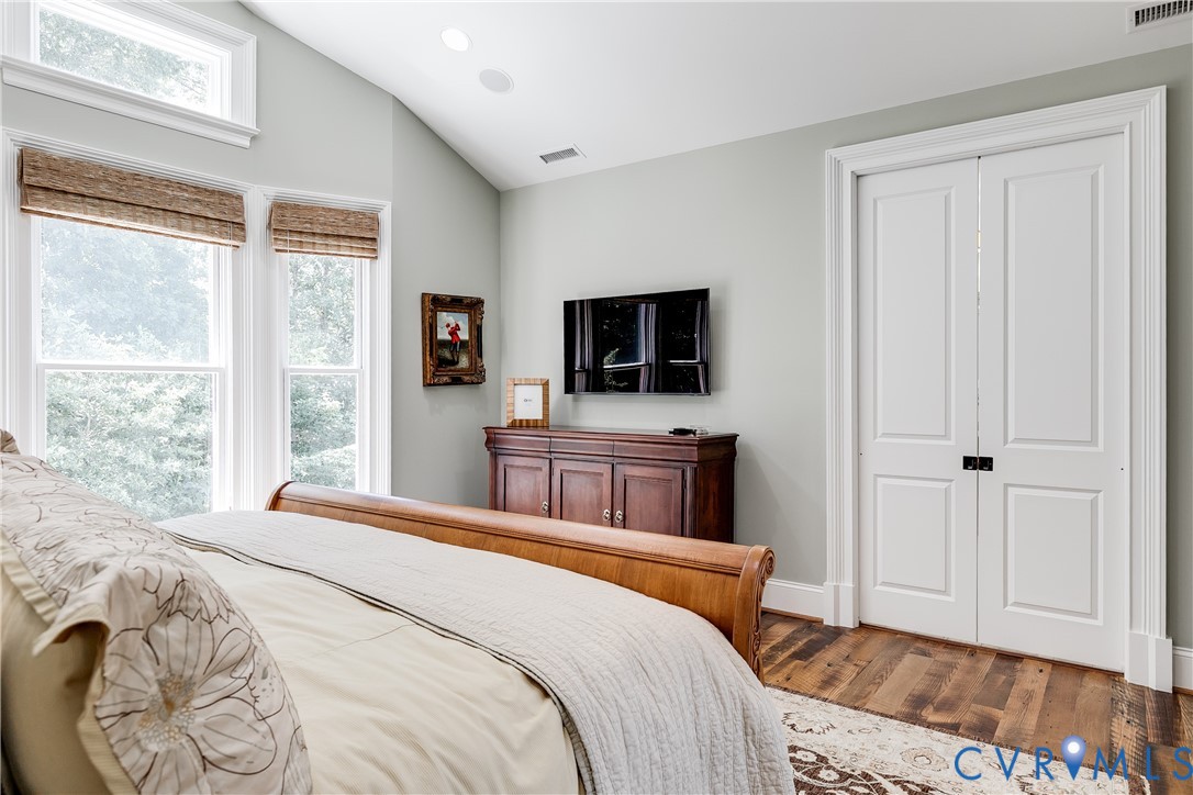 202 Kinloch Road Manakin-Sabot, VA 23103 - Photo 30 of 51 a bedroom with a bed and a flat screen tv
