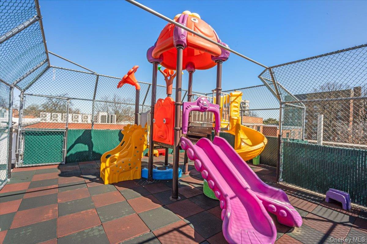87-22 51st Avenue, Unit 4E Queens, NY 11373 - Photo 8 of 15 a view of a wooden chairs in a backyard