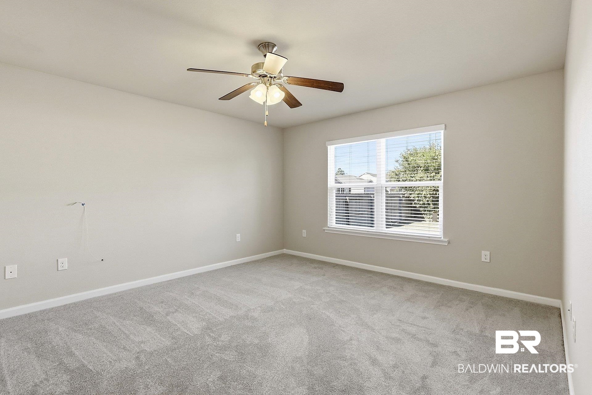 983 Summerton Drive Foley, AL 36535 - Photo 14 of 25 Unfurnished room featuring light colored carpet and ceiling fan