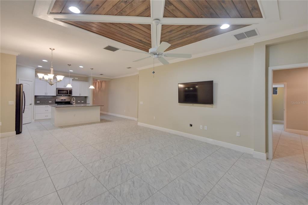 7408 Ridgelake Circle Bradenton, FL 34203 - Photo 18 of 39 a view of a livingroom with a flat screen tv