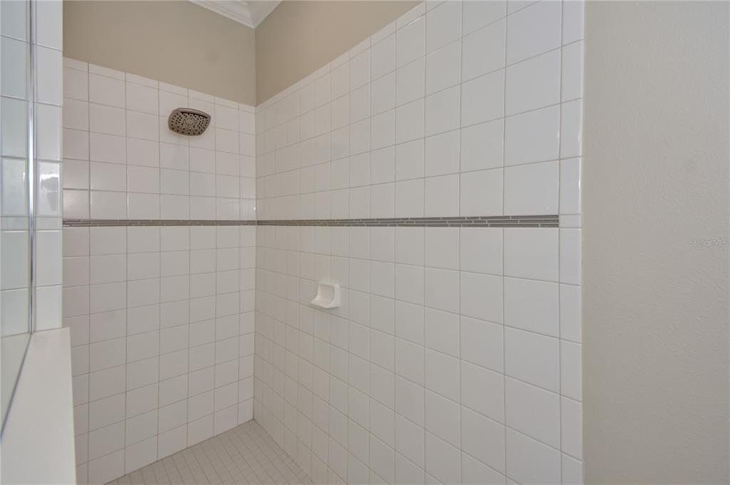 7408 Ridgelake Circle Bradenton, FL 34203 - Photo 30 of 39 a bathroom with a shower