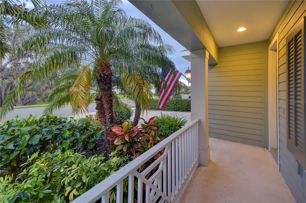 7408 Ridgelake Circle Bradenton, FL 34203 - Photo 3 of 39 a view of a balcony with flower plants