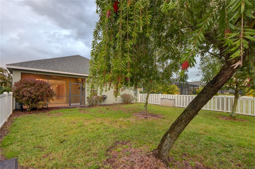7408 Ridgelake Circle Bradenton, FL 34203 - Photo 37 of 39 a view of a backyard with a garden and entertaining space