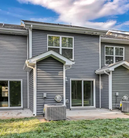 a view of a house with a large window and a large window