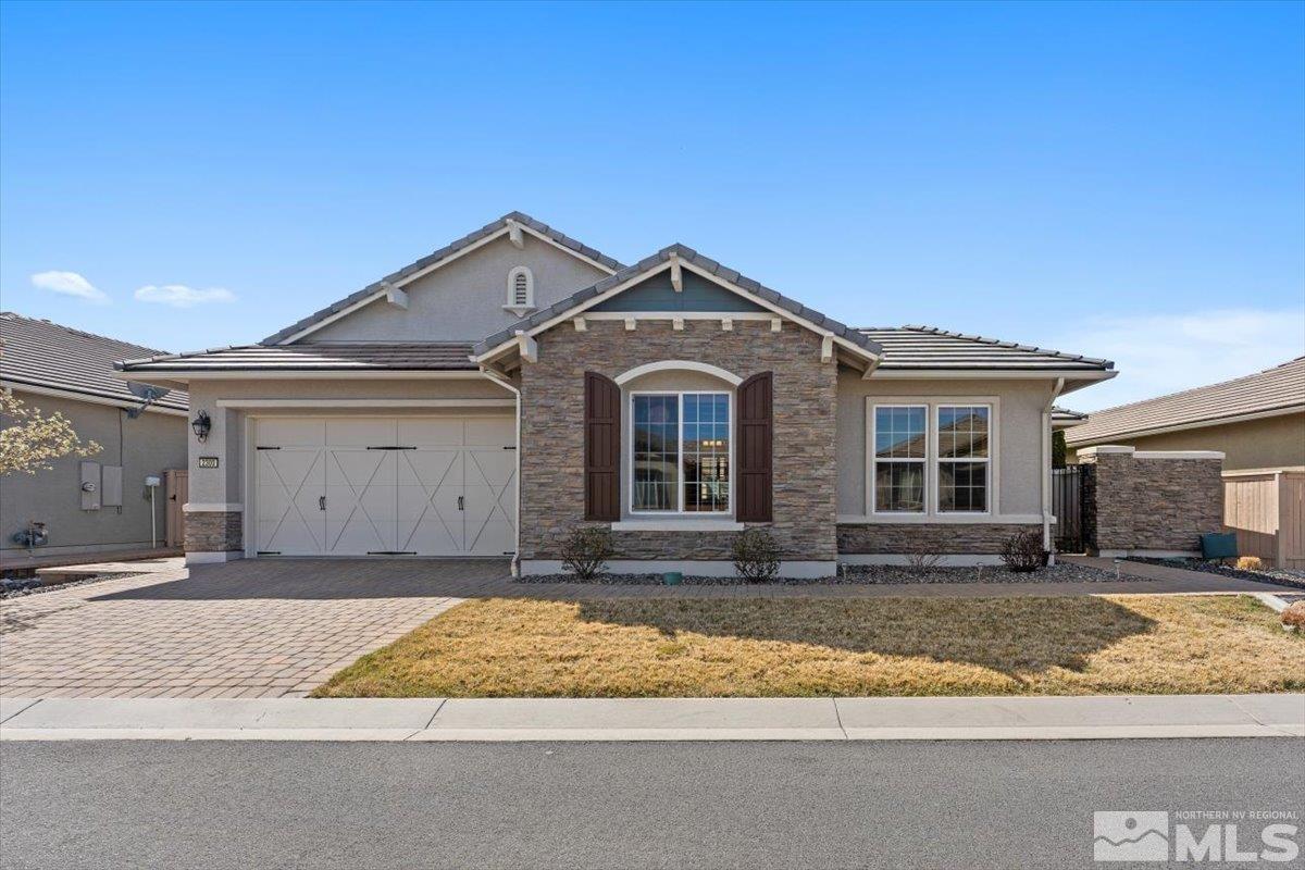 2300 Arpagos Lane Reno, NV 89521 - Photo 1 of 40 a front view of a house with a yard