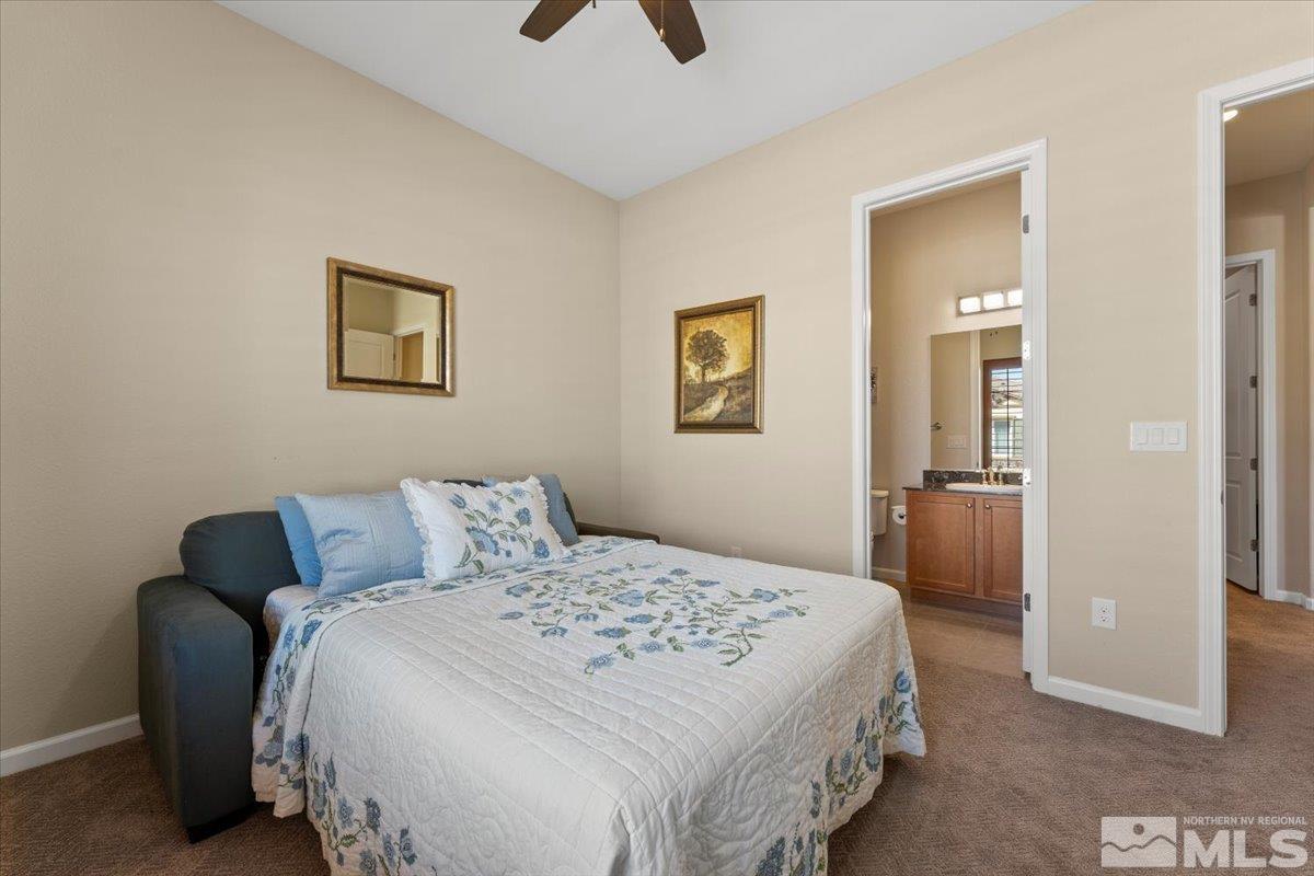 2300 Arpagos Lane Reno, NV 89521 - Photo 20 of 40 a bedroom with a bed and a painting