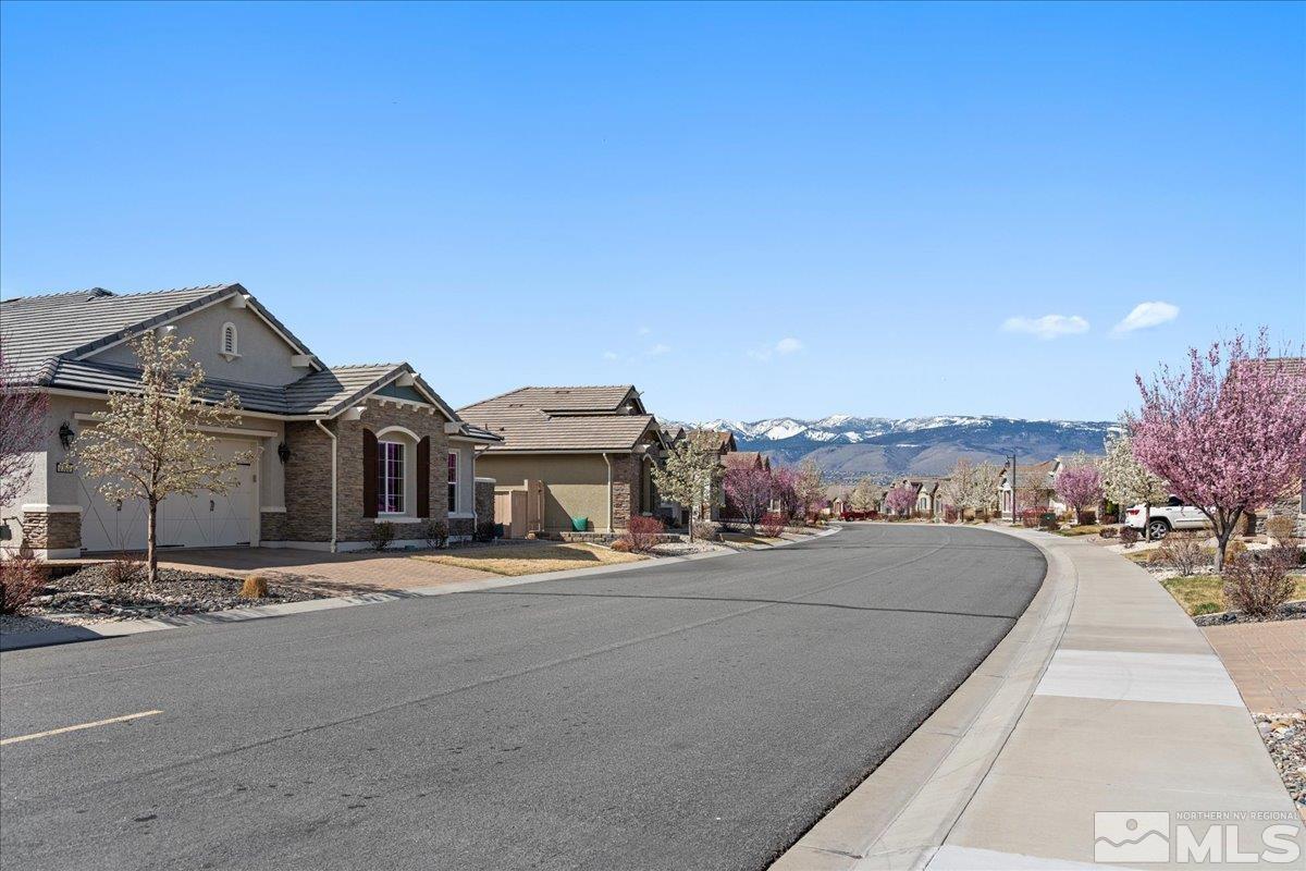 2300 Arpagos Lane Reno, NV 89521 - Photo 2 of 40 a view of a street with a building in the background