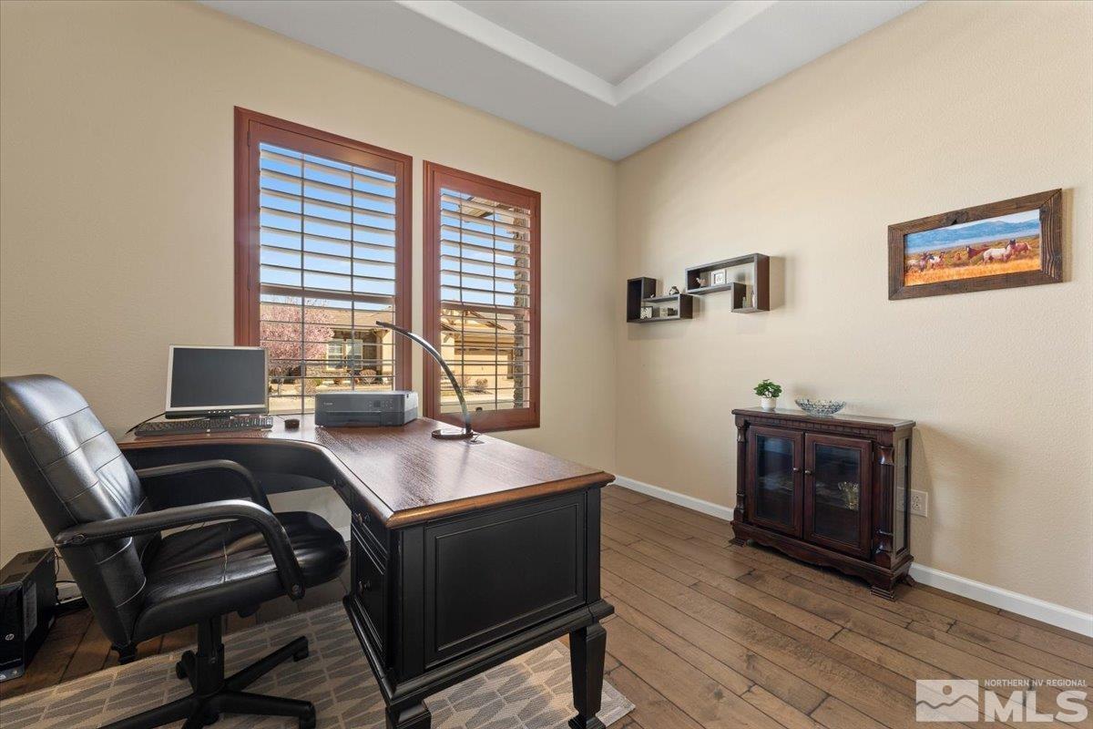 2300 Arpagos Lane Reno, NV 89521 - Photo 22 of 40 a view of a workspace with furniture and a window