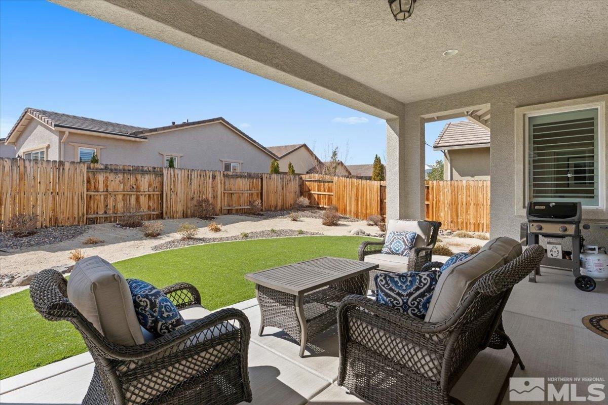 2300 Arpagos Lane Reno, NV 89521 - Photo 25 of 40 a living room with furniture and a large window