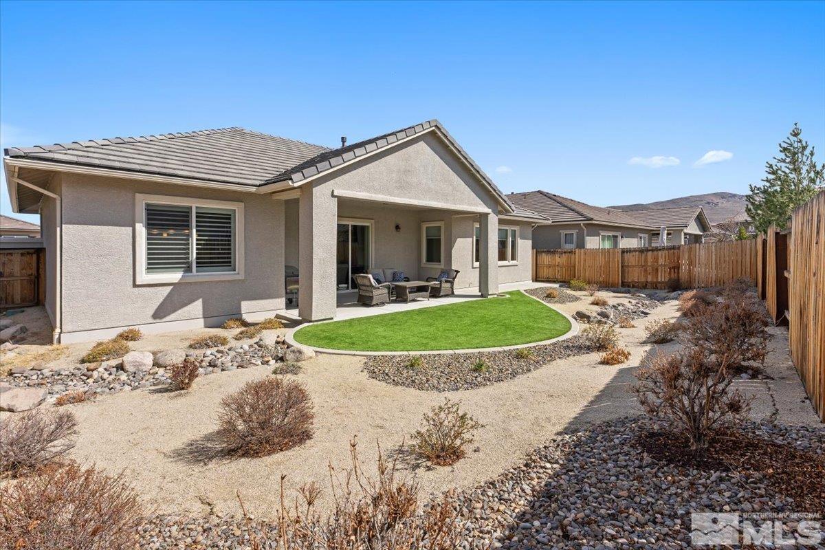 2300 Arpagos Lane Reno, NV 89521 - Photo 28 of 40 a view of a house with a swimming pool