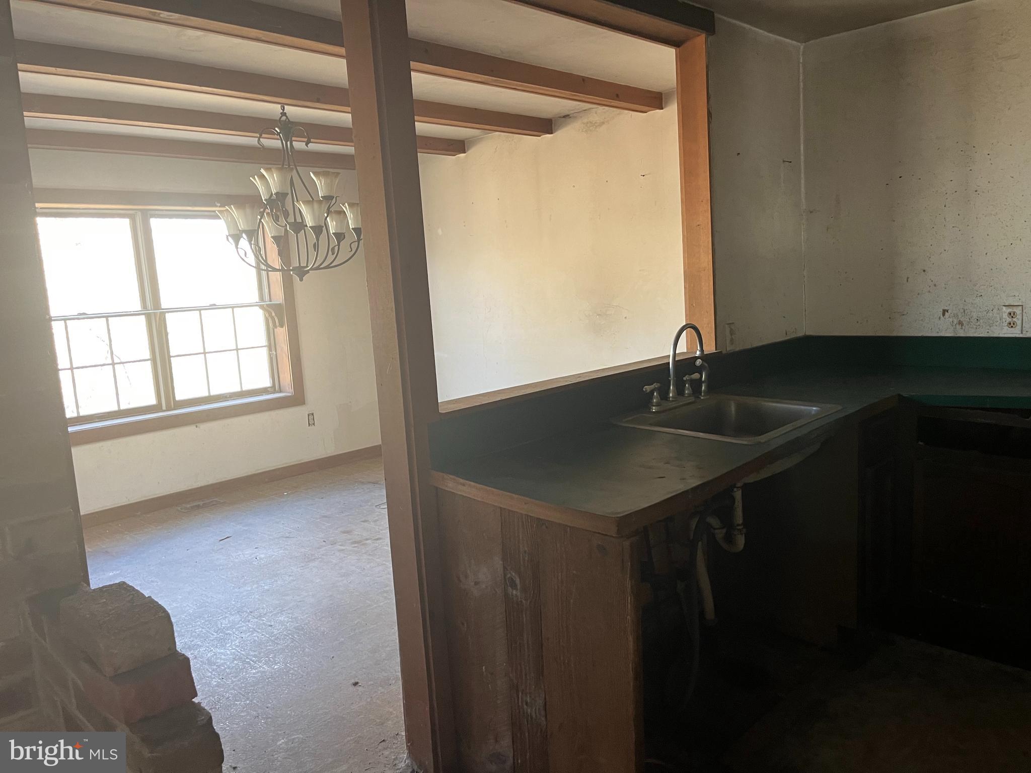 1165 Apple Road Quakertown, PA 18951 - Photo 13 of 46 a kitchen with a sink cabinets and a window