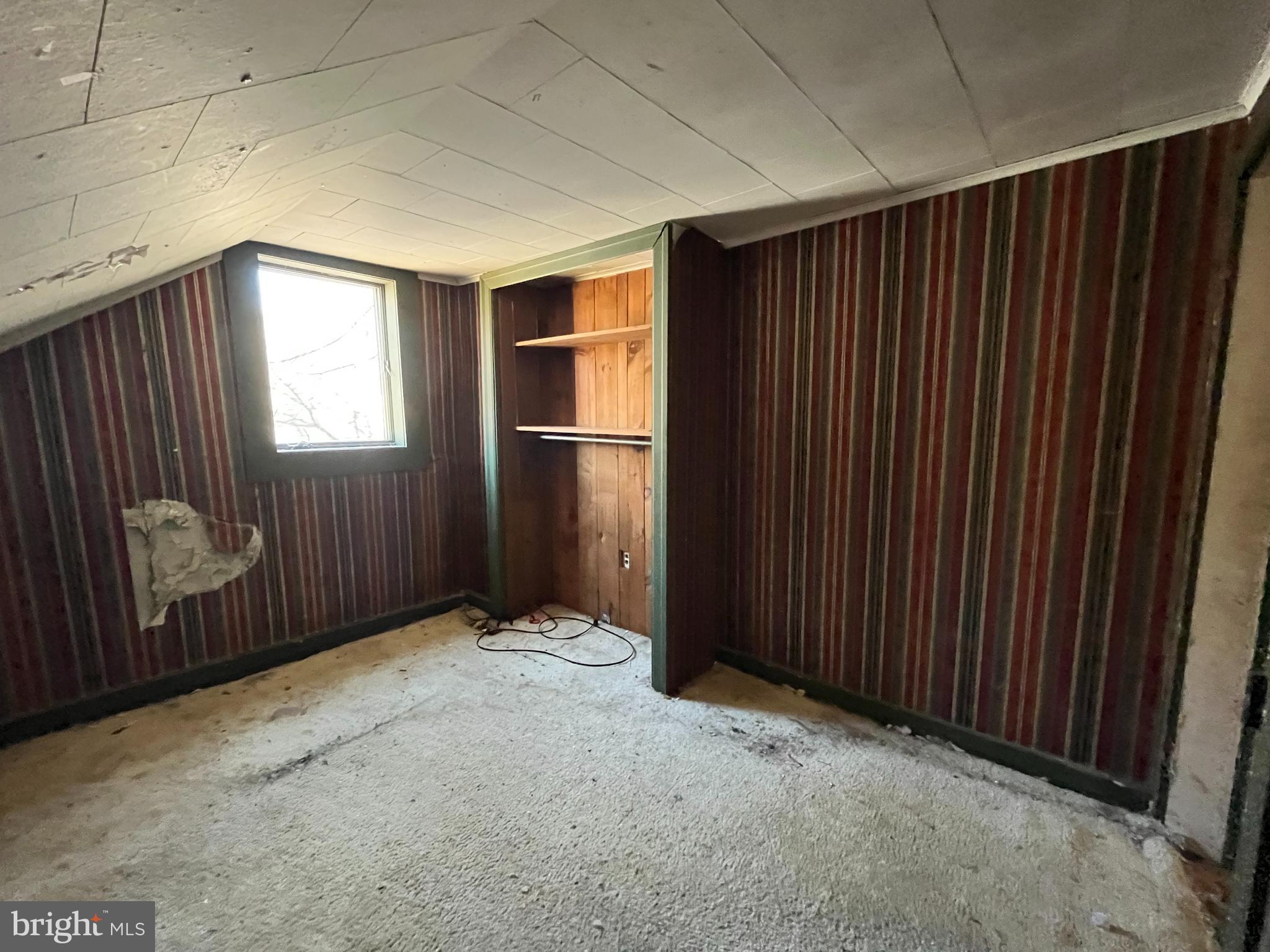 1165 Apple Road Quakertown, PA 18951 - Photo 21 of 46 a view of an empty room with wooden walls