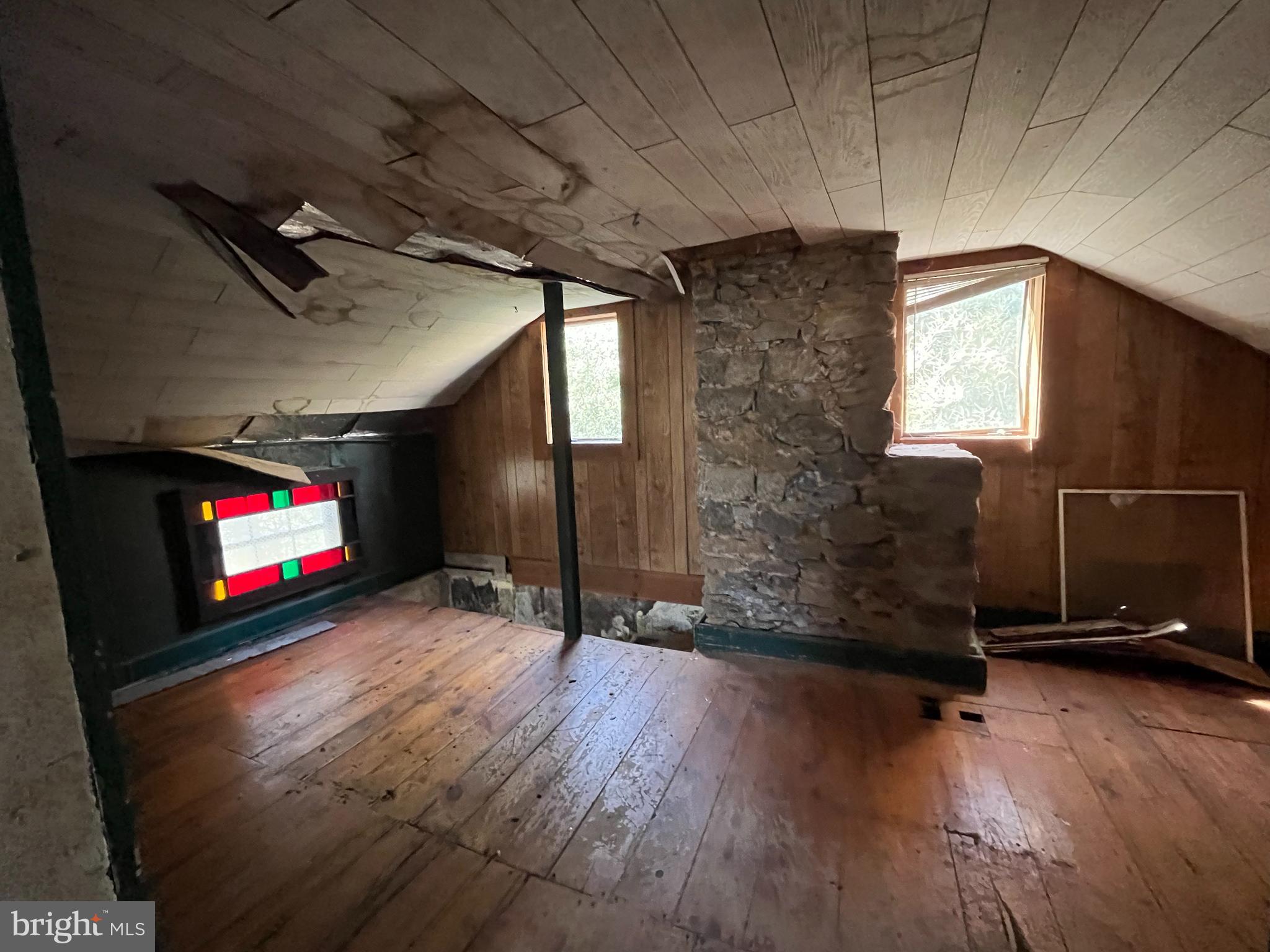 1165 Apple Road Quakertown, PA 18951 - Photo 22 of 46 an empty room with wooden floor and windows