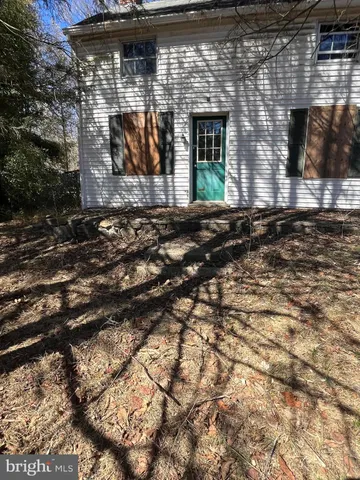 a view of a building with a tree