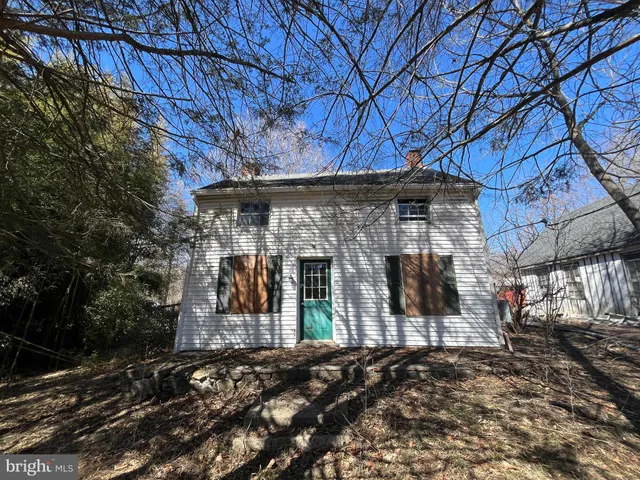 a view of side of snow with trees