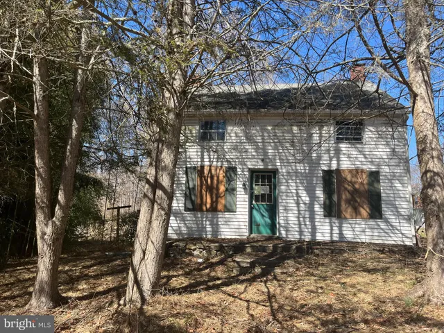 a brick house with large windows