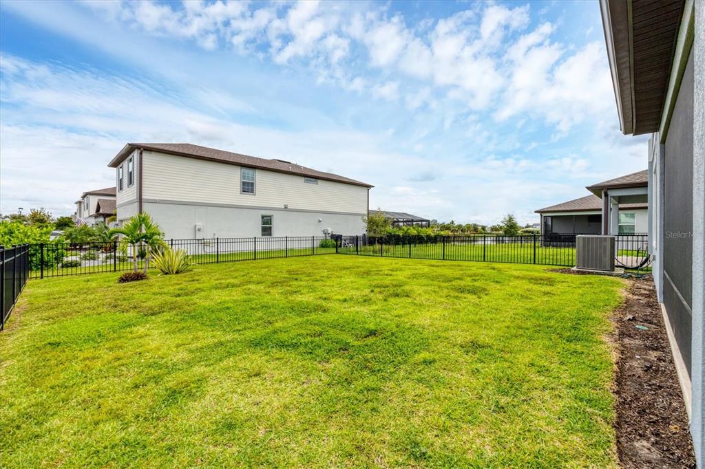 9528 Lamine Way Parrish, FL 34219 - Photo 35 of 58 a view of a back yard of the house