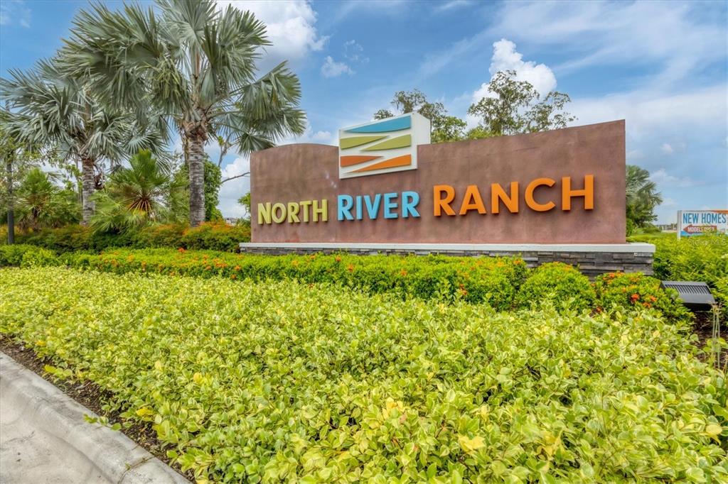 9528 Lamine Way Parrish, FL 34219 - Photo 38 of 58 a sign on the side of the road