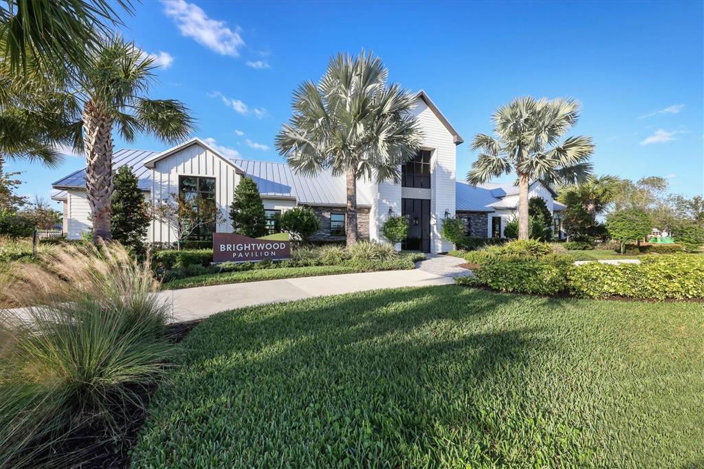 9528 Lamine Way Parrish, FL 34219 - Photo 40 of 58 a front view of a house with a yard