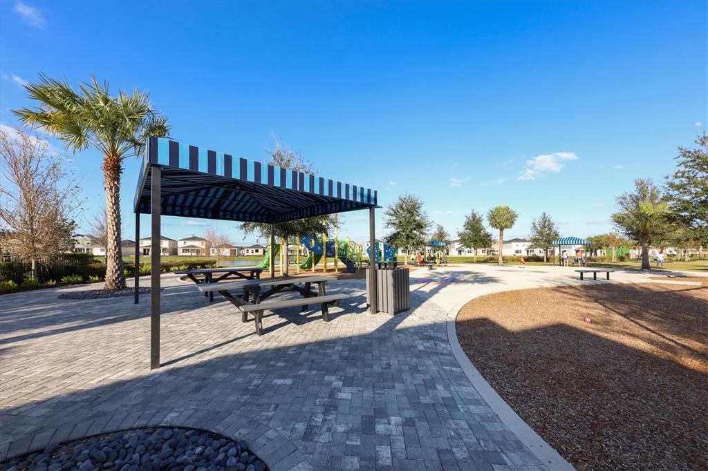 9528 Lamine Way Parrish, FL 34219 - Photo 49 of 58 a view of swimming pool with outdoor seating