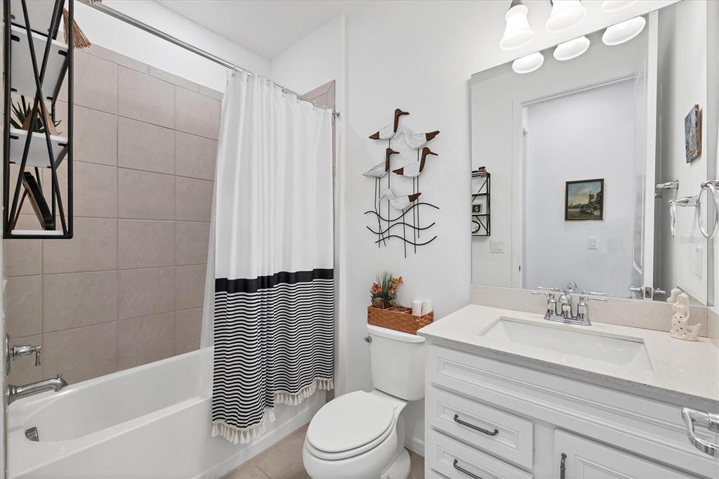 9528 Lamine Way Parrish, FL 34219 - Photo 10 of 58 a bathroom with a sink toilet and shower