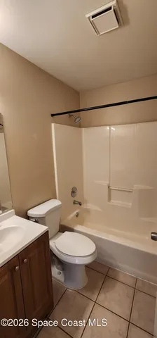 a view of backyard with green space