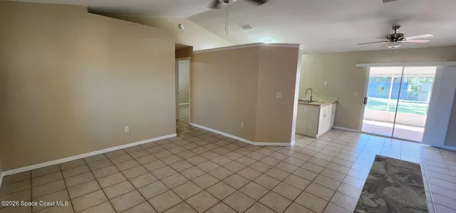 a view of an empty room and window